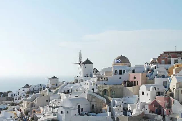 Whitewashed village with a windmill, upscaled
